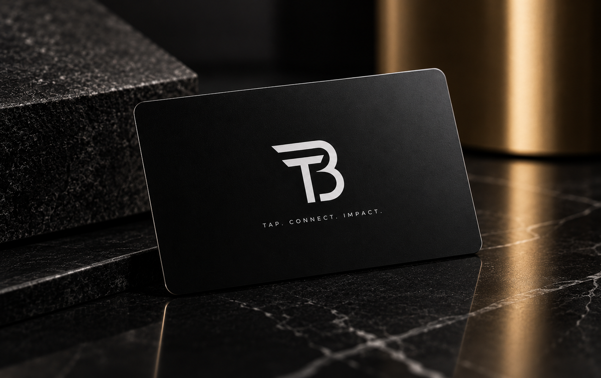 BLACKTAP Pro card standing on black marble with a gold reflection behind it